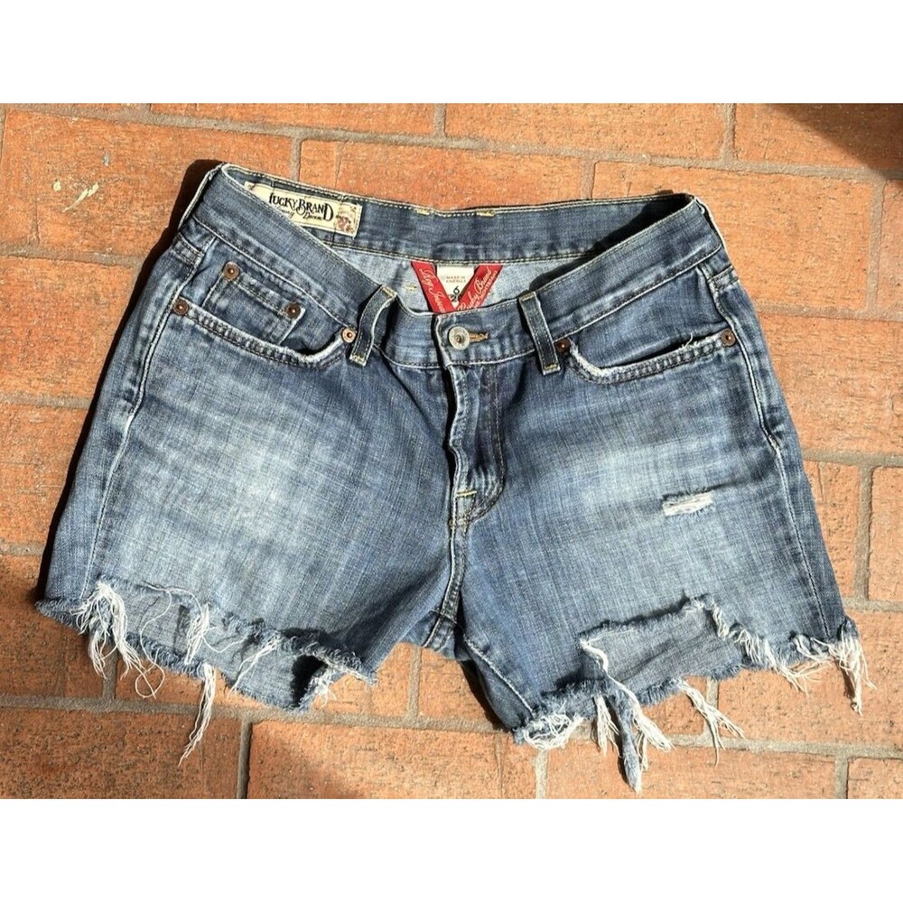 Vintage y2k low rise Lucky Brand denim distressed mini shorts size 6